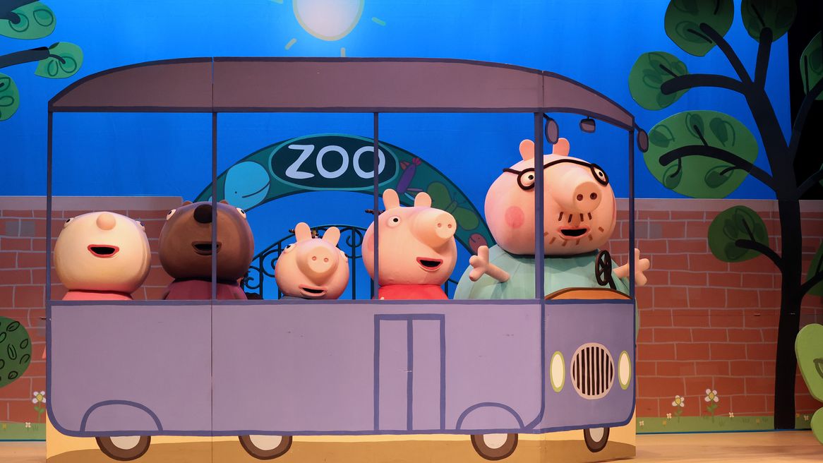 Peppa Pig and friends riding on a train to the zooon a train 