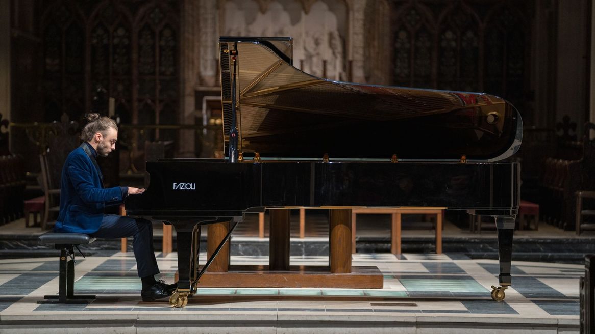 Conductor with a baton directing musicians