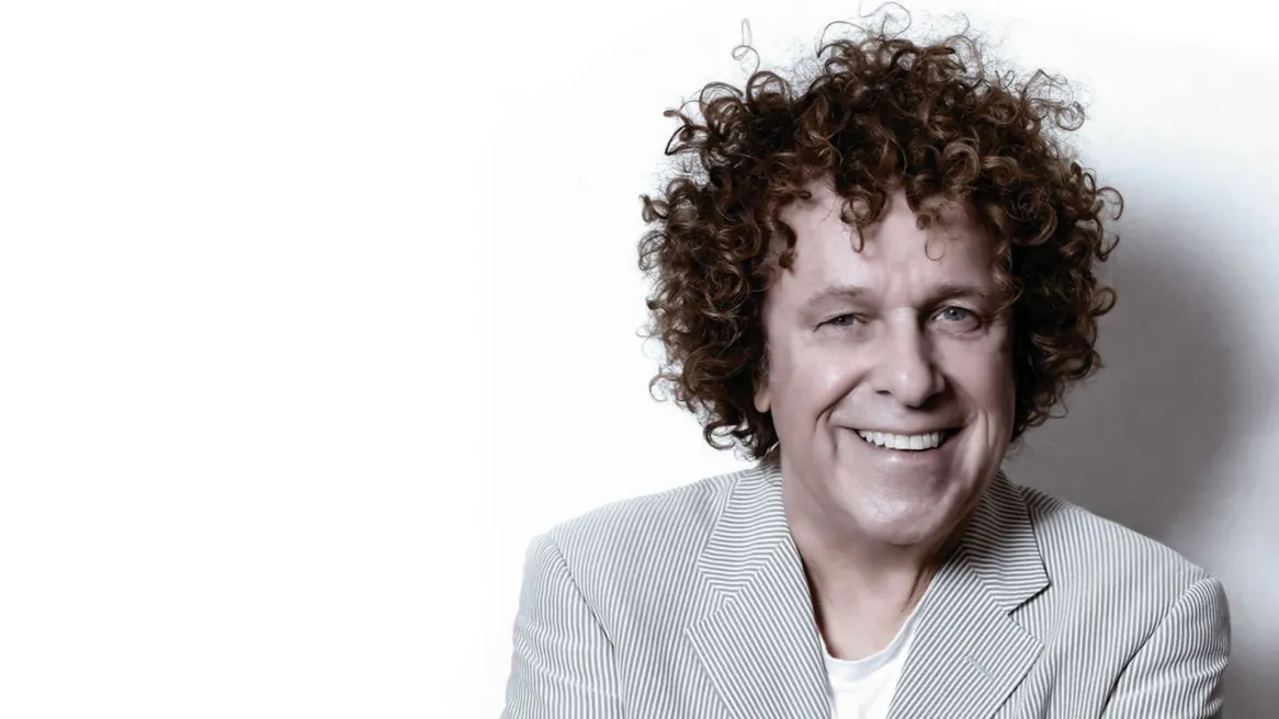 Singer Leo Sayer wearing a grey jacket